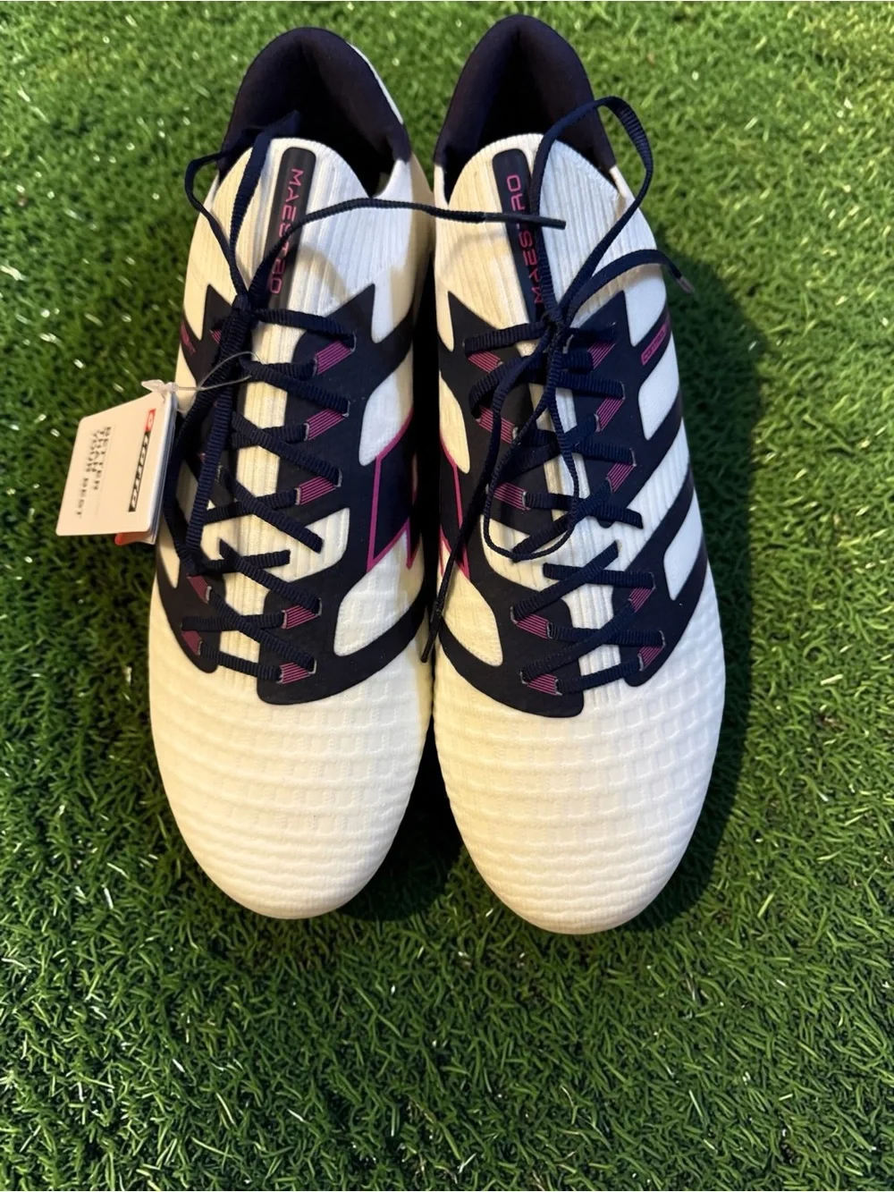 Lotto Maestro 100 IV FG soccer cleats in white with blue and pink details. -nwt